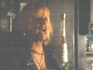 Screenshot of Bonnie as bartender in The Doors (2)