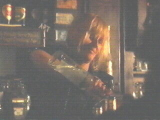 Screenshot of Bonnie as bartender in The Doors (1)